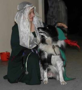 Stacy and her dog Flip dressed as Maid Marion and Robin Hood