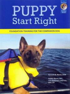 Cover of the book "Puppy Start Right", showing a puppy in a yellow life jacket in front of water